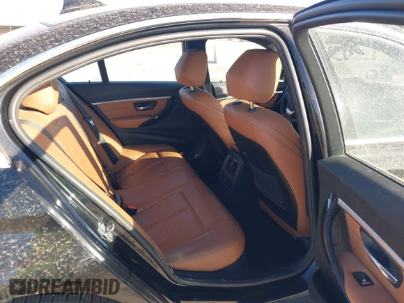 2017 BMW 3 Series 330e iPerformance with VIN WBA8E1C34HA156688, listed as a IAAI auction lot 41753490 with 74,130 mi miles. Bid and sale history available at carsss.com. Image 8.