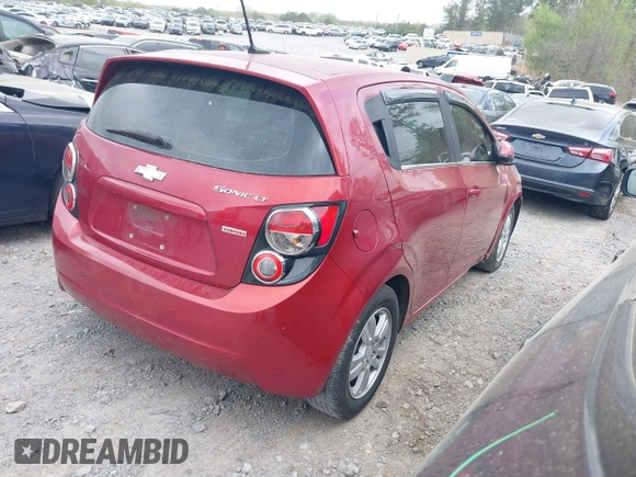 2012 Chevrolet Sonic LT z VIN 1G1JD6SBXC4179292, wystawiony jako IAAI lot #41940825 z przebiegiem 185 150 mil mil oraz . Historia ofert i sprzedaży dostępna na DreamBid. Obrazek 4.