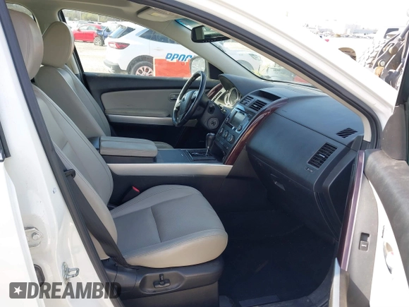 2014 Mazda CX-9 Grand Touring with VIN JM3TB3DA8E0427369, listed as a IAAI auction lot 41860129 with 152,888 mi miles and . Bid and sale history available at DreamBid. Image 5.