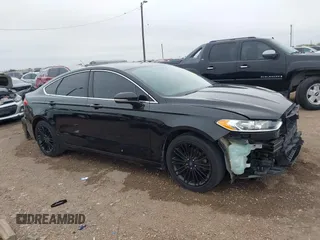 2014 Ford Fusion SE with VIN 1FA6P0HDXE5356467, listed as a IAAI auction lot 41252963 with 147,252 mi miles and . Bid and sale history available at DreamBid. Image 14.