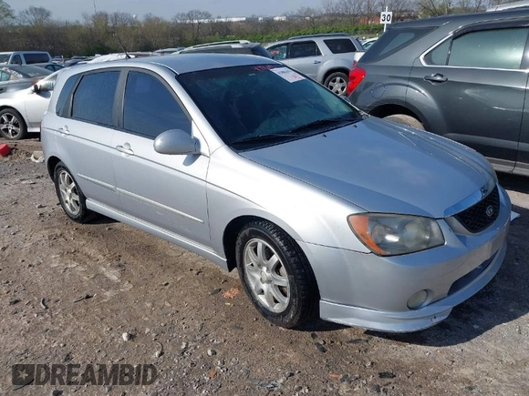 2006 Kia Spectra with VIN KNAFE161365208111, listed as a IAAI auction lot 41886193 with 292,535 mi miles. Bid and sale history available at carsss.com. Image 1.