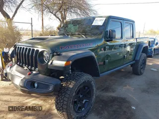 2021 Jeep Gladiator Mojave with VIN 1C6JJTEG8ML606876, listed as a IAAI auction lot 41632052 with 30,255 mi miles and . Bid and sale history available at DreamBid. Image 6.