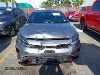 2024 Kia Forte GT z VIN 3KPF44AC7RE802984, wystawiony jako IAAI lot #42147389 z przebiegiem 7018 mil mil oraz . Historia ofert i sprzedaży dostępna na DreamBid. Obrazek 12.