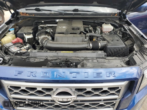 2022 Nissan Frontier SV z VIN 1N6ED1EJ5NN659197, wystawiony jako Copart lot #51265805 z przebiegiem 68 682 mil mil oraz Szkoda całkowita • Salvage title. Historia ofert i sprzedaży dostępna na DreamBid. Obrazek 11.