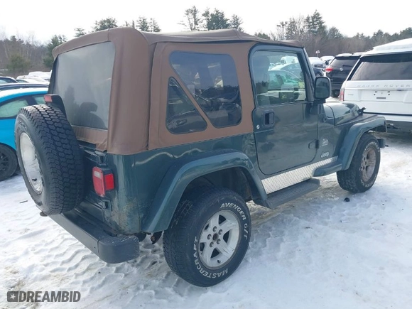 2004 Jeep Wrangler Sahara with VIN 1J4FA59S74P736918, listed as a IAAI auction lot 41632100 with NaN miles. Bid and sale history available at carsss.com. Image 4.