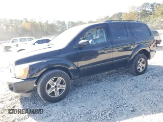 2004 Dodge Durango SLT z VIN 1D4HD48N04F211932, wystawiony jako Copart lot #80087524 z przebiegiem 244 552 mil mil oraz Szkoda całkowita • Salvage title. Historia ofert i sprzedaży dostępna na DreamBid. Obrazek 1.