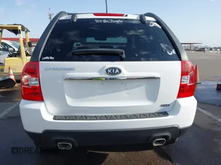 2009 Kia Sportage LX with VIN KNDJF723197622517, listed as a IAAI auction lot 41771268 with 127,112 mi miles. Bid and sale history available at carsss.com. Image 17.