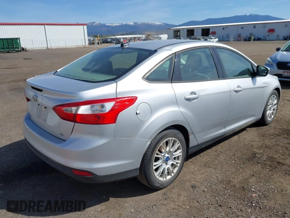 2012 Ford Focus SE with VIN 1FAHP3F24CL178236, listed as a IAAI auction lot 42032272 with 157,373 mi miles and . Bid and sale history available at carsss.com. Image 4.