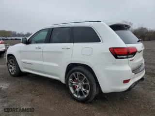 2015 Jeep Grand Cherokee SRT with VIN 1C4RJFDJ6FC941941, listed as a Copart auction lot 50613315 with 173,992 mi miles and Salvage Title. Bid and sale history available at carsss.com. Image 2.
