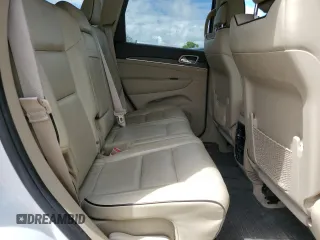 2018 Jeep Grand Cherokee High Altitude z VIN 1C4RJFCT9JC444510, wystawiony jako Copart lot #58078285 z przebiegiem 98 226 mil mil oraz Szkoda całkowita • Salvage title. Historia ofert i sprzedaży dostępna na DreamBid. Obrazek 11.