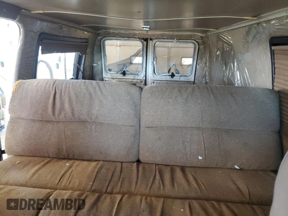1987 Ford Econoline Cargo with VIN 1FTEE24N6HHB45016, listed as a Copart auction lot 50947745 with 62,721 mi miles and Salvage Title. Bid and sale history available at DreamBid. Image 10.