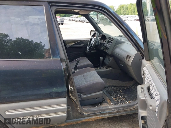 1999 Toyota RAV4 with VIN JT3HP10V2X7120498, listed as a IAAI auction lot 42409235 with 215,769 mi miles and . Bid and sale history available at DreamBid. Image 5.