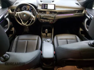 2021 BMW X1 sDrive28i z VIN WBXJG7C04M5S68209, wystawiony jako Copart lot #52099115 z przebiegiem 57 497 mil mil oraz Szkody całkowita. Historia ofert i sprzedaży dostępna na DreamBid. Obrazek 8.