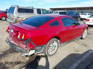 2012 Ford Mustang V6 Premium with VIN 1ZVBP8AM7C5270903, listed as a IAAI auction lot 41631200 with 171,138 mi miles. Bid and sale history available at carsss.com. Image 4.