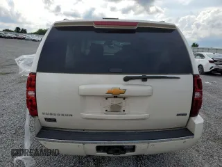 2012 Chevrolet Suburban LTZ with VIN 1GNSKKE7XCR288587, listed as a Copart auction lot 58721725 with 234,900 mi miles and Salvage title. Bid and sale history available at DreamBid. Image 6.