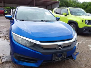 2018 Honda Civic LX with VIN 19XFC2F51JE043724, listed as a IAAI auction lot 42092461 with 176,743 mi miles and . Bid and sale history available at DreamBid. Image 12.