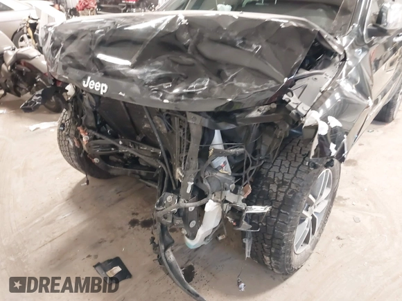 2021 Jeep Grand Cherokee 80th Anniversary with VIN 1C4RJFBG5MC732694, listed as a IAAI auction lot 41410124 with 84,958 mi miles and . Bid and sale history available at DreamBid. Image 6.