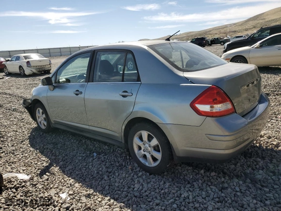 2007 Nissan Versa 1.8 S with VIN 3N1BC11E17L446450, listed as a Copart auction lot 52631415 with 121,006 mi miles and Salvage Title. Bid and sale history available at carsss.com. Image 2.