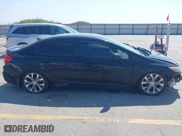 2012 Honda Civic Si z VIN 2HGFB6E57CH700823, wystawiony jako IAAI lot #42477635 z przebiegiem 144 889 mil mil oraz . Historia ofert i sprzedaży dostępna na DreamBid. Obrazek 13.
