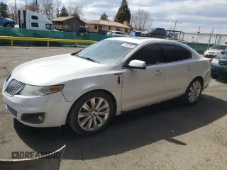 2010 Lincoln MKS EcoBoost with VIN 1LNHL9FT0AG616527, listed as a Copart auction lot 51182185 with 111,901 mi miles and Salvage title. Bid and sale history available at DreamBid. Image 1.