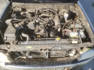 2004 Toyota Tacoma z VIN 5TEVL52N74Z451886, wystawiony jako Copart lot #52329405 z przebiegiem 240 156 mil mil oraz Szkoda całkowita • Salvage title. Historia ofert i sprzedaży dostępna na DreamBid. Obrazek 11.