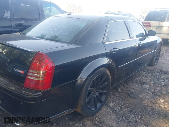 2006 Chrysler 300 C SRT8 with VIN 2C3LA73W66H249303, listed as a IAAI auction lot 42009645 with 137,242 mi miles. Bid and sale history available at carsss.com. Image 4.