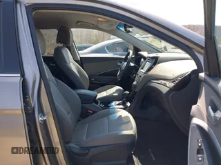 2017 Hyundai Santa Fe 2.4L z VIN 5NMZUDLB7HH015347, wystawiony jako IAAI lot #42035606 z przebiegiem 118 305 mil mil oraz . Historia ofert i sprzedaży dostępna na DreamBid. Obrazek 5.