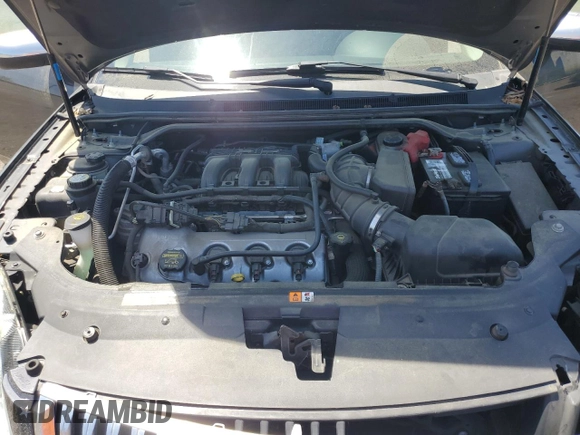 2008 Mercury Sable Premier z VIN 1MEHM42W58G618979, wystawiony jako Copart lot #55401905 z przebiegiem 85 683 mil mil oraz Szkoda całkowita • Salvage title. Historia ofert i sprzedaży dostępna na DreamBid. Obrazek 11.