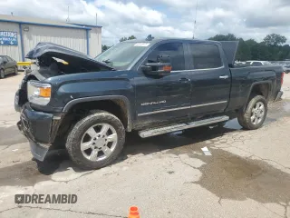 2018 GMC Sierra 2500HD Denali with VIN 1GT12UEYXJF128166, listed as a Copart auction lot 58815875 with 136,777 mi miles and Salvage title. Bid and sale history available at DreamBid. Image 1.