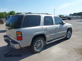 2005 GMC Yukon Denali z VIN 1GKEK63U55J266766, wystawiony jako IAAI lot #42430195 z przebiegiem Nie podano mil oraz . Historia ofert i sprzedaży dostępna na DreamBid. Obrazek 4.