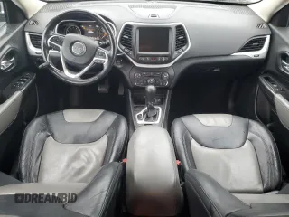 2014 Jeep Cherokee Limited with VIN 1C4PJLDS0EW106560, listed as a Copart auction lot 60785405 with 91,662 mi miles and Salvage title. Bid and sale history available at DreamBid. Image 8.