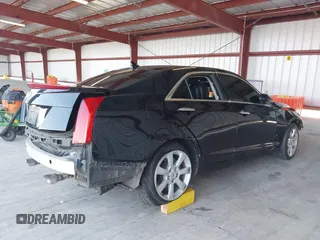 2014 Cadillac ATS Standard RWD with VIN 1G6AA5RX3E0159300, listed as a IAAI auction lot 40271449 with 124,125 mi miles. Bid and sale history available at carsss.com. Image 4.
