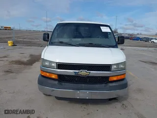 2013 Chevrolet Express Passenger 1LT with VIN 1GAZG1FA6D1191442, listed as a IAAI auction lot 41911629 with 122,796 mi miles. Bid and sale history available at carsss.com. Image 12.