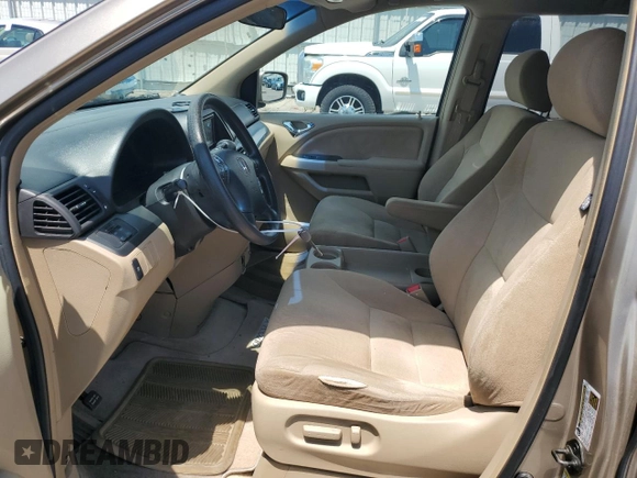 2006 Honda Odyssey EX with VIN 5FNRL38426B401762, listed as a Copart auction lot 61018525 with 145,370 mi miles and Salvage title. Bid and sale history available at DreamBid. Image 7.