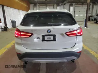 2017 BMW X1 xDrive28i with VIN WBXHT3Z34H4A54811, listed as a Copart auction lot 63584405 with 92,699 mi miles and Salvage title. Bid and sale history available at DreamBid. Image 6.