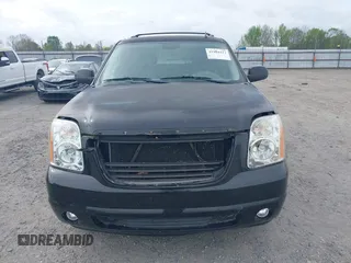 2014 GMC Yukon SLT with VIN 1GKS2CE03ER248683, listed as a IAAI auction lot 41904412 with 147,156 mi miles and . Bid and sale history available at DreamBid. Image 12.