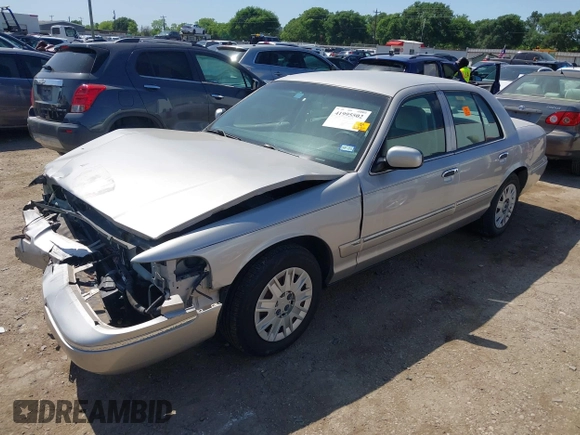 2005 Mercury Grand Marquis GS with VIN 2MEFM74W05X653375, listed as a IAAI auction lot 41995502 with 200,083 mi miles and . Bid and sale history available at DreamBid. Image 2.