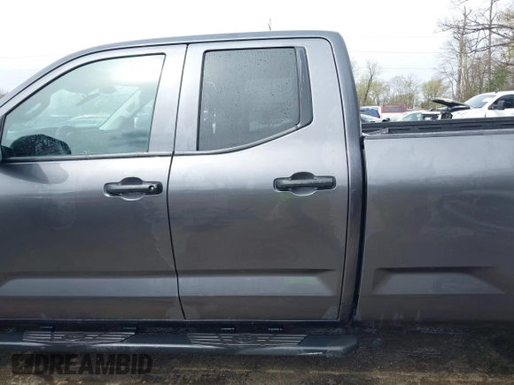 2023 Toyota Tundra with VIN 5TFKB5GDXPX002218, listed as a IAAI auction lot 41932719 with 71,335 mi miles and . Bid and sale history available at DreamBid. Image 14.