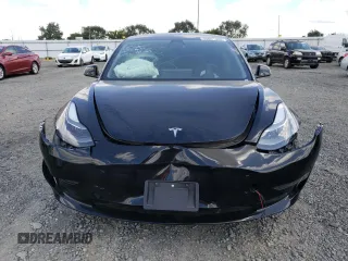 2023 Tesla Model 3 with VIN 5YJ3E1EA6PF454254, listed as a Copart auction lot 56881355 with 30,327 mi miles and Salvage title. Bid and sale history available at DreamBid. Image 5.