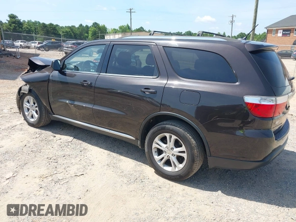 2013 Dodge Durango SXT with VIN 1C4RDJAG7DC580249, listed as a IAAI auction lot 42535723 with 199,626 mi miles and . Bid and sale history available at DreamBid. Image 3.