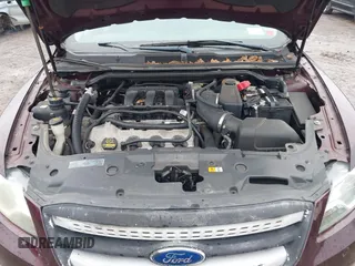 2011 Ford Taurus SE with VIN 1FAHP2DW7BG136988, listed as a IAAI auction lot 42002512 with 145,847 mi miles. Bid and sale history available at carsss.com. Image 10.
