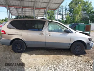 2002 Toyota Sienna LE with VIN 4T3ZF13C82U465335, listed as a IAAI auction lot 40274809 with 178,560 mi miles and . Bid and sale history available at DreamBid. Image 13.