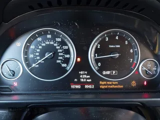 2013 BMW 5 Series 528i with VIN WBAXG5C57DDY35944, listed as a IAAI auction lot 41666595 with 157,683 mi miles and . Bid and sale history available at carsss.com. Image 7.