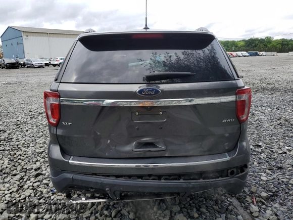 2018 Ford Explorer XLT with VIN 1FM5K8D80JGA94660, listed as a Copart auction lot 59012215 with 105,331 mi miles and Salvage title. Bid and sale history available at DreamBid. Image 6.