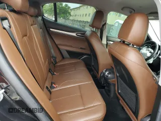 2018 Alfa Romeo Stelvio Sport z VIN ZASFAKPN8J7B79599, wystawiony jako Copart lot #57396135 z przebiegiem 73 873 mil mil oraz Nie do naprawy. Historia ofert i sprzedaży dostępna na DreamBid. Obrazek 11.
