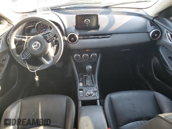 2019 Mazda CX-3 Grand Touring with VIN JM1DKFD77K0447529, listed as a Copart auction lot 43562565 with 57,321 mi miles and Salvage Title. Bid and sale history available at DreamBid. Image 8.