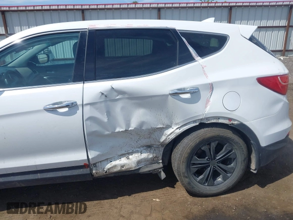 2016 Hyundai Santa Fe z VIN 5XYZTDLB9GG364375, wystawiony jako IAAI lot #42203404 z przebiegiem 143 838 mil mil oraz . Historia ofert i sprzedaży dostępna na DreamBid. Obrazek 6.