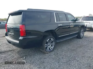 2019 Chevrolet Suburban LT with VIN 1GNSCHKC2KR408575, listed as a IAAI auction lot 42060103 with 144,838 mi miles and . Bid and sale history available at DreamBid. Image 4.