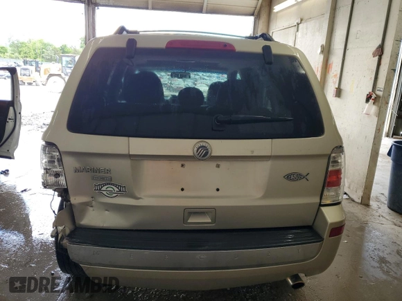 2010 Mercury Mariner Premier z VIN 4M2CN8H75AKJ06362, wystawiony jako Copart lot #56414635 z przebiegiem 193 089 mil mil oraz Szkoda całkowita • Salvage title. Historia ofert i sprzedaży dostępna na DreamBid. Obrazek 6.