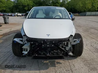 2022 Tesla Model Y Long Range z VIN 7SAYGDEE5NF355624, wystawiony jako Copart lot #58058465 z przebiegiem 33 784 mil mil oraz Szkoda całkowita • Salvage title. Historia ofert i sprzedaży dostępna na DreamBid. Obrazek 5.